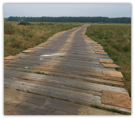 plywood on timber mat